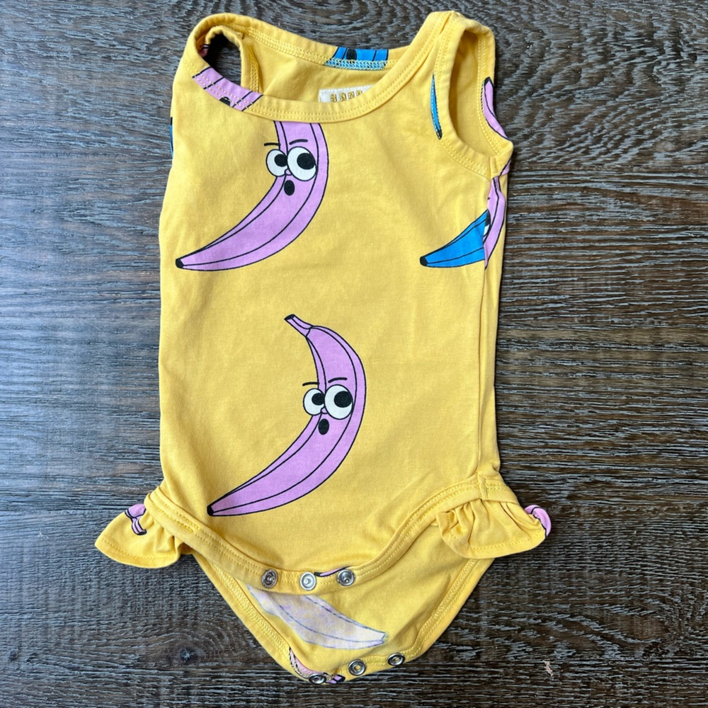 Hugo Loves Tiki onsie